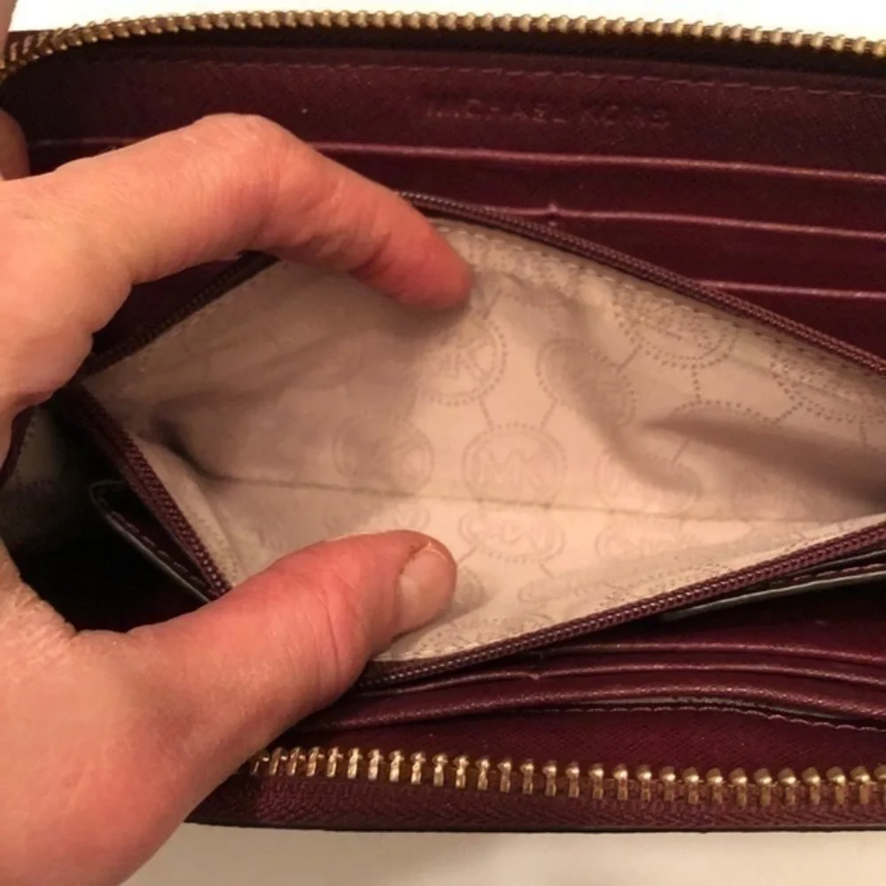 Michael kors burgundy continental zipper wallet